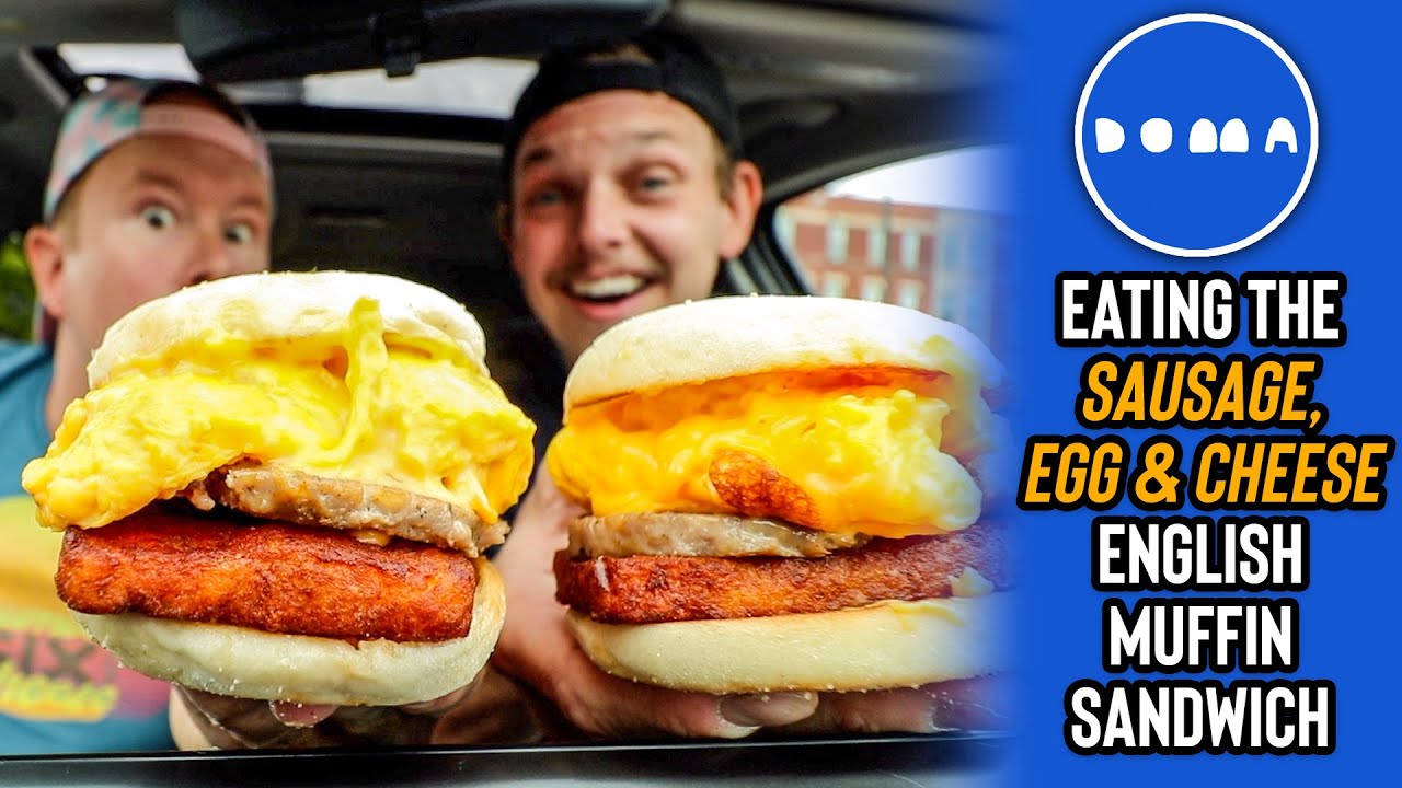 Eating Doma Cafe's Sausage, Egg & Cheese English Muffin Breakfast Sandwich