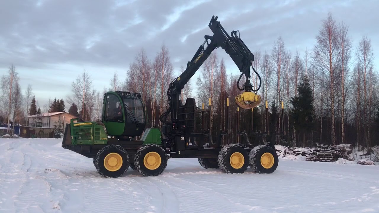John Deere 1210E -2010