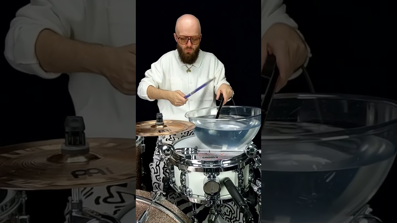WATER + DRUMS + BALD MAN