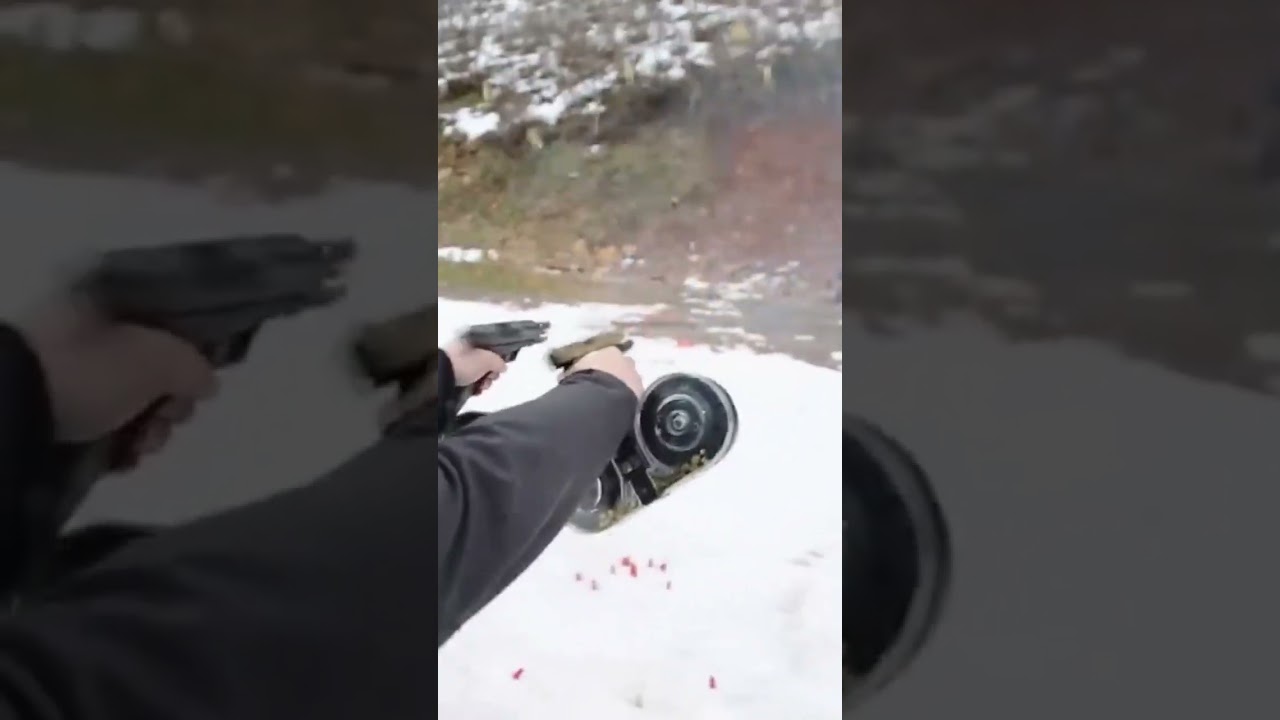 Dual wielding full auto glocks with 100 round drum mags