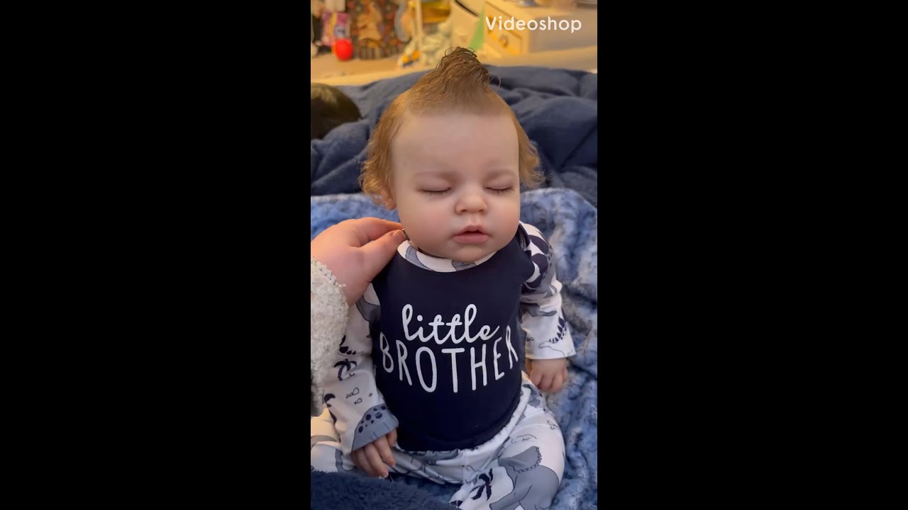 Elijah james ( noah sculpt) by rivia shrick getting an outfit change.