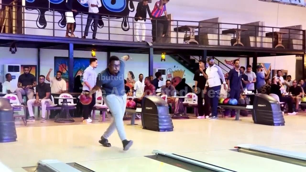 Young Somalis welcome Mogadishu's first bowling alley as signs of everyday life re-emerge