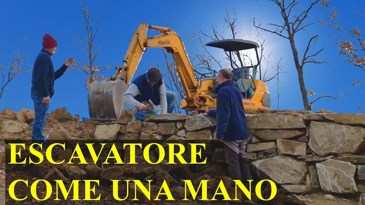 Costruire muro a secco con il Komatsu PC40