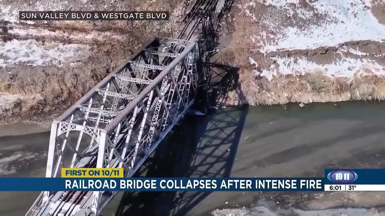 Railroad bridge collapses after fire -6 p.m.