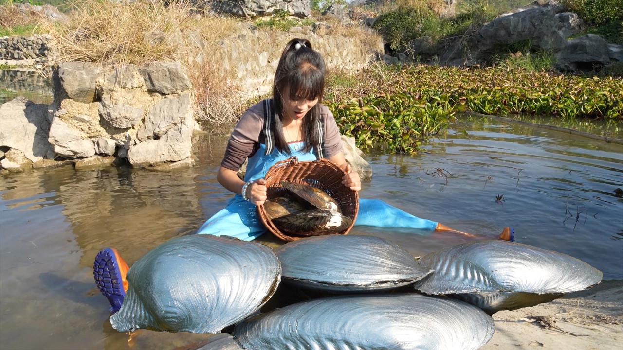 Rural Girl's Precious Moment: 🎁 Shining Pearl in Clam During a Heartwarming Family Reunion