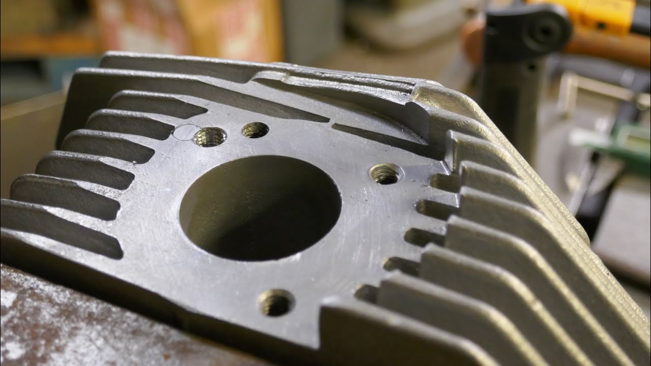 Moto Guzzi cylinder head repair part 2. One hole plugged (no welding!), two holes Helicoiled.