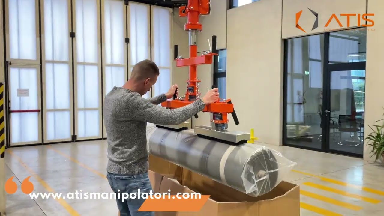 Sollevamento bobine tessuto con manipolatore_Fabric rolls lifting: fast, safe