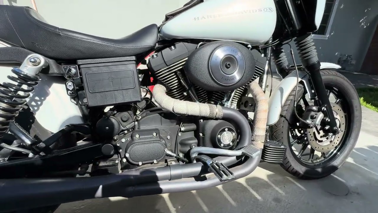 For sale 2001 Harley dyna fxdx with OEM fxdxt t sport fairing and bags. 