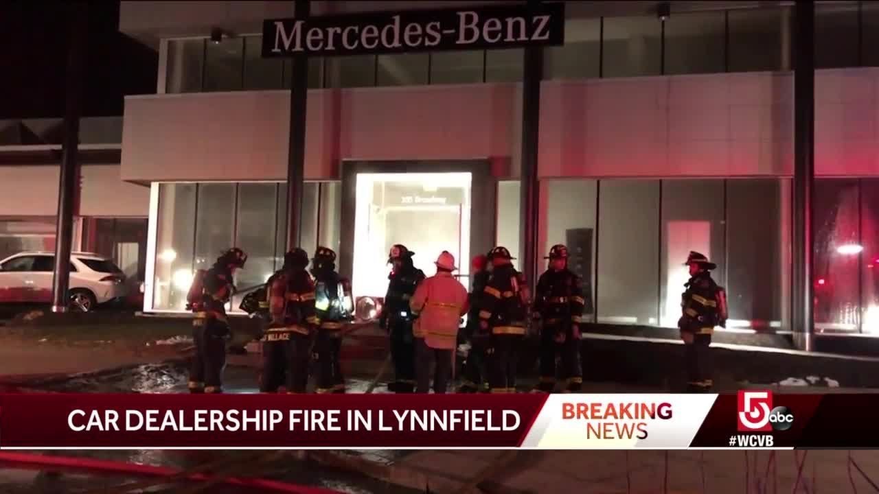 Crews battle fire in Mercedes dealership showroom