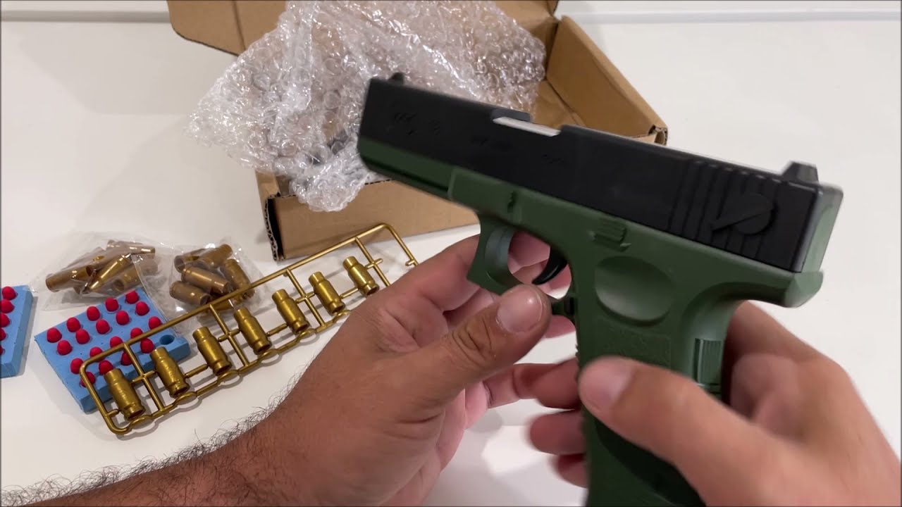 Игрушечный пистолет Glock с функцией выброса гильз с мягкими пулями. Учебный КРАТКИЙ ОБЗОР 2022