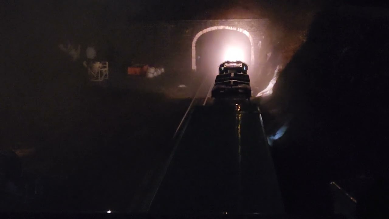 An eastbound intermodal through the fog and into the Allegheny tunnel here at mile post 248. 