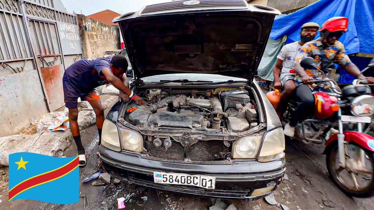 Chassis repair on a Toyota in the middle of an African city