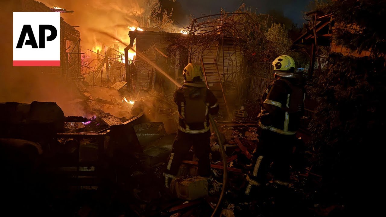 Aftermath in Kyiv as officials say city hit by Russian drone attack