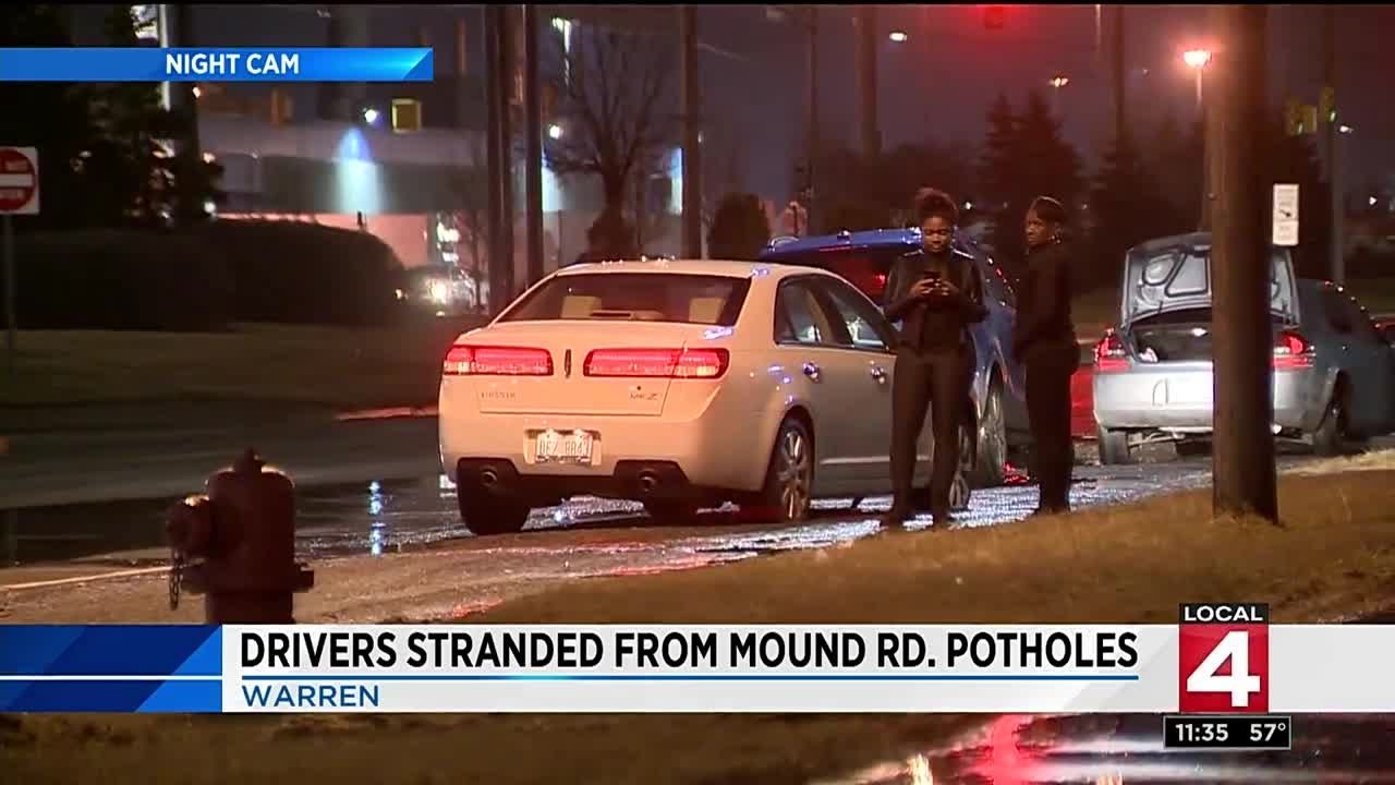 Drivers stranded from Mound Road potholes in Warren