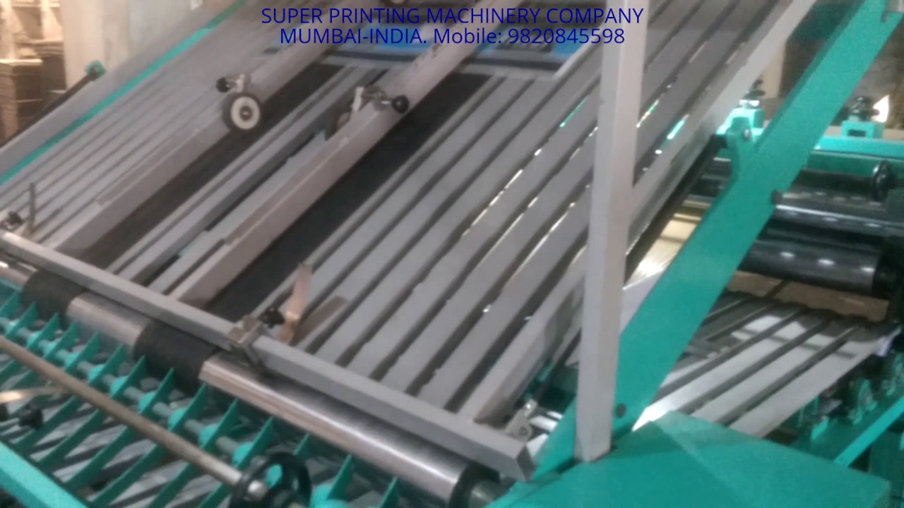 AUTOMATIC PASTING MACHINE FOR CORRUGATED BOXES