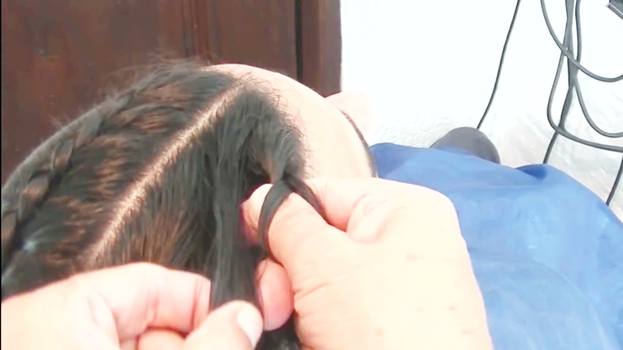 Peinado con dos trenzas invertidas