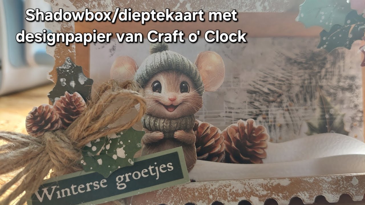 Maak een shadowbox/dieptekaart met mij. We gebruiken het designpapier van Craft o' Clock.