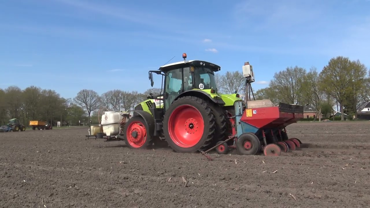aardappels poten met een claas 510 arion en met een gruse vl 18 pootmachine