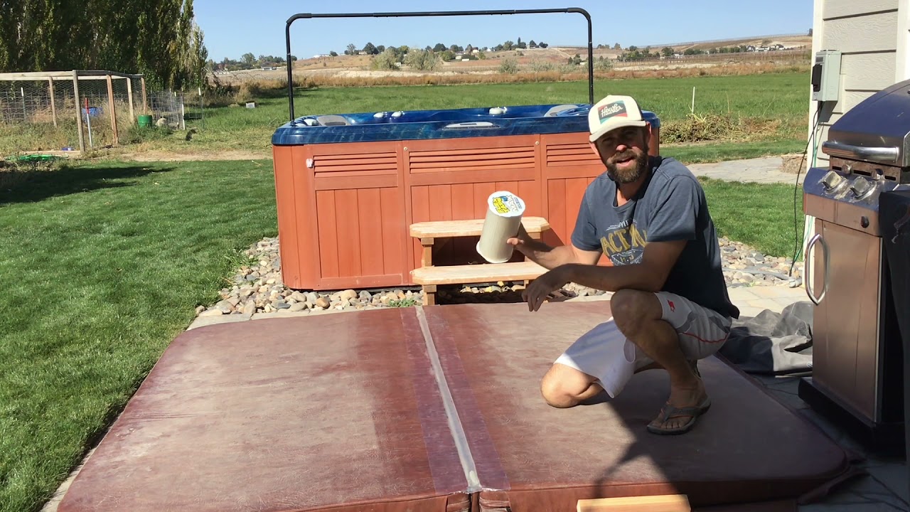 Hot tub cover repair using flex tape.