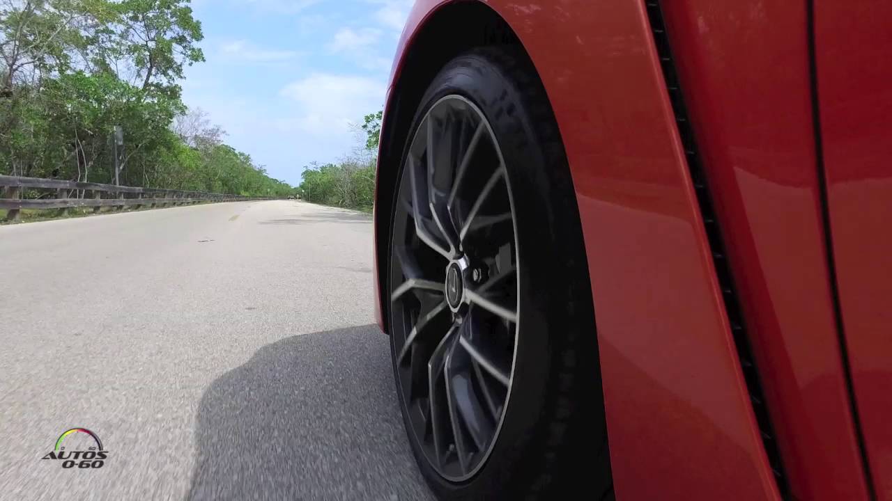 Why do car wheels spin backwards on video?