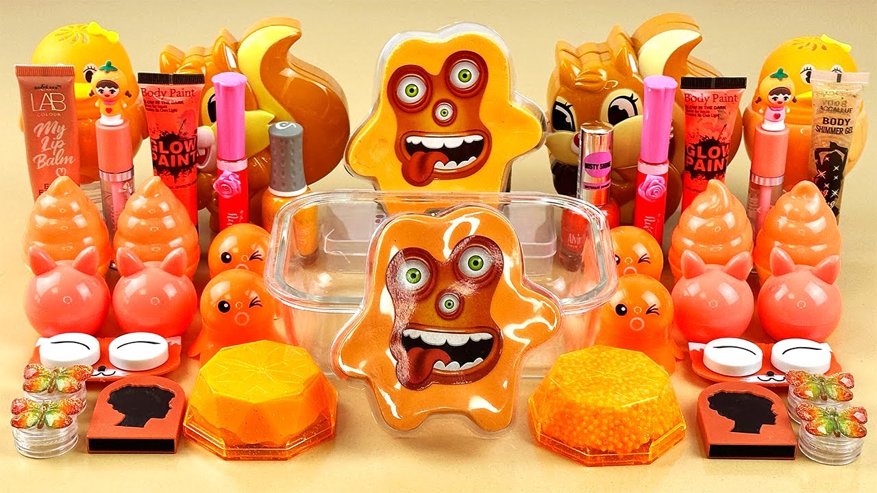ASMR Slime Mixing ”ORANGE” 🧡💦💤 makeup, Eyeshadow, glitter into slime. Satisfying slime video.