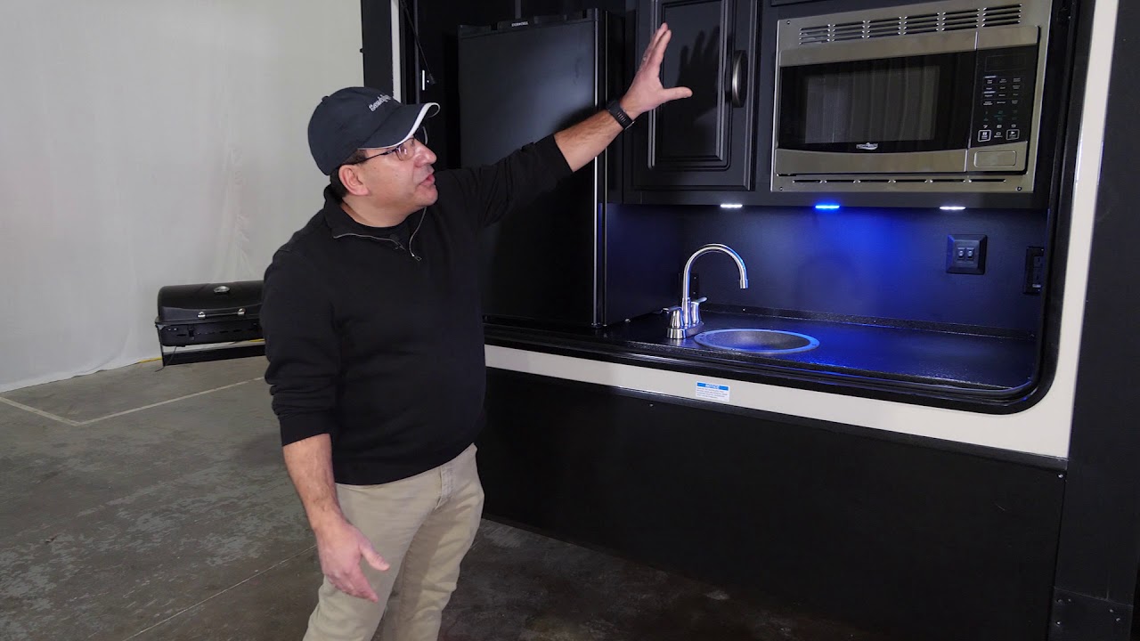 Take a tour of the 2021 Sandpiper 379FLOK (Front Living - Outside Kitchen)