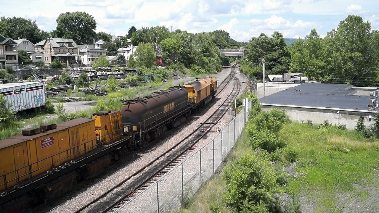 [MW][T-268] Loram Rail Grinder moves through town | Trains 21