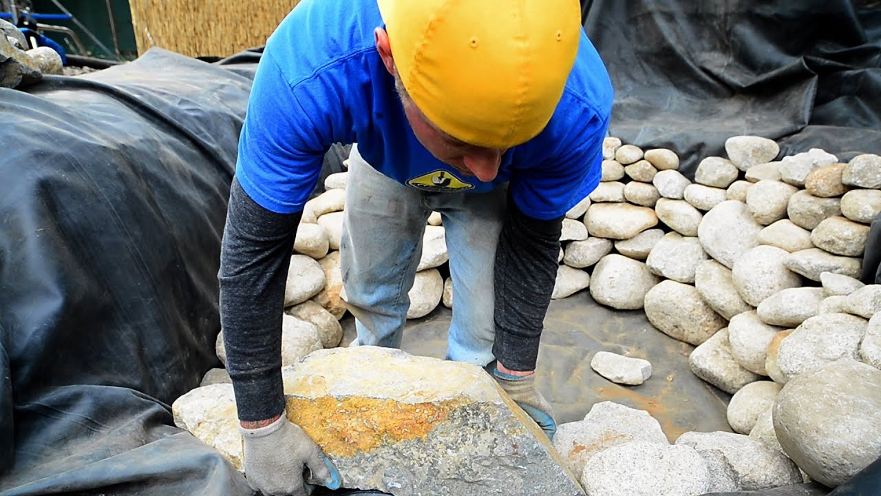 How to build a Fish Pond - Part 8 | Pond Construction Rock Placement (1 of 2)