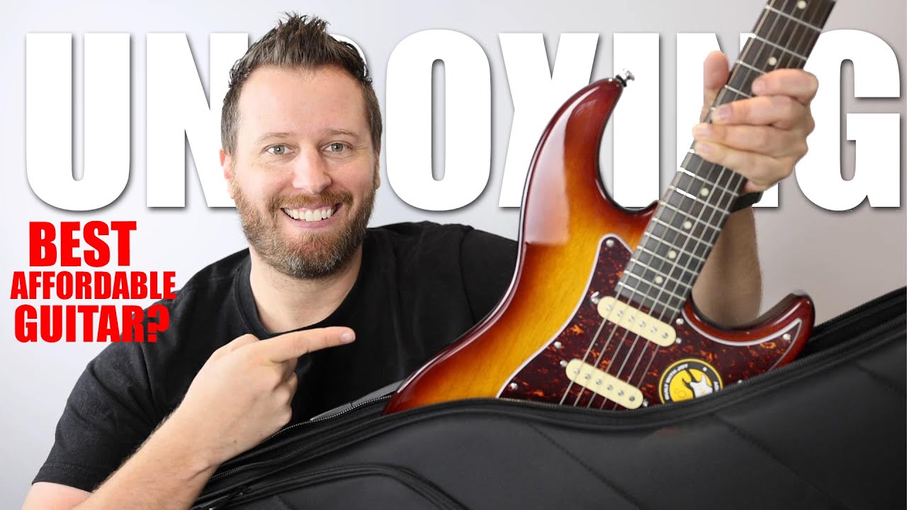 Распаковываю ЛУЧШУЮ БЮДЖЕТНУЮ гитару Stratocaster, на которой я КОГДА-ЛИБО играл...