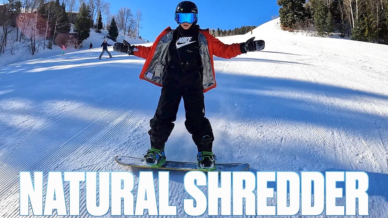 INSANE KID SNOWBOARDING FOR THE SECOND TIME TRIES SNOWBOARD TRICK PARK | HOW TO JUMP ON A SNOWBOARD