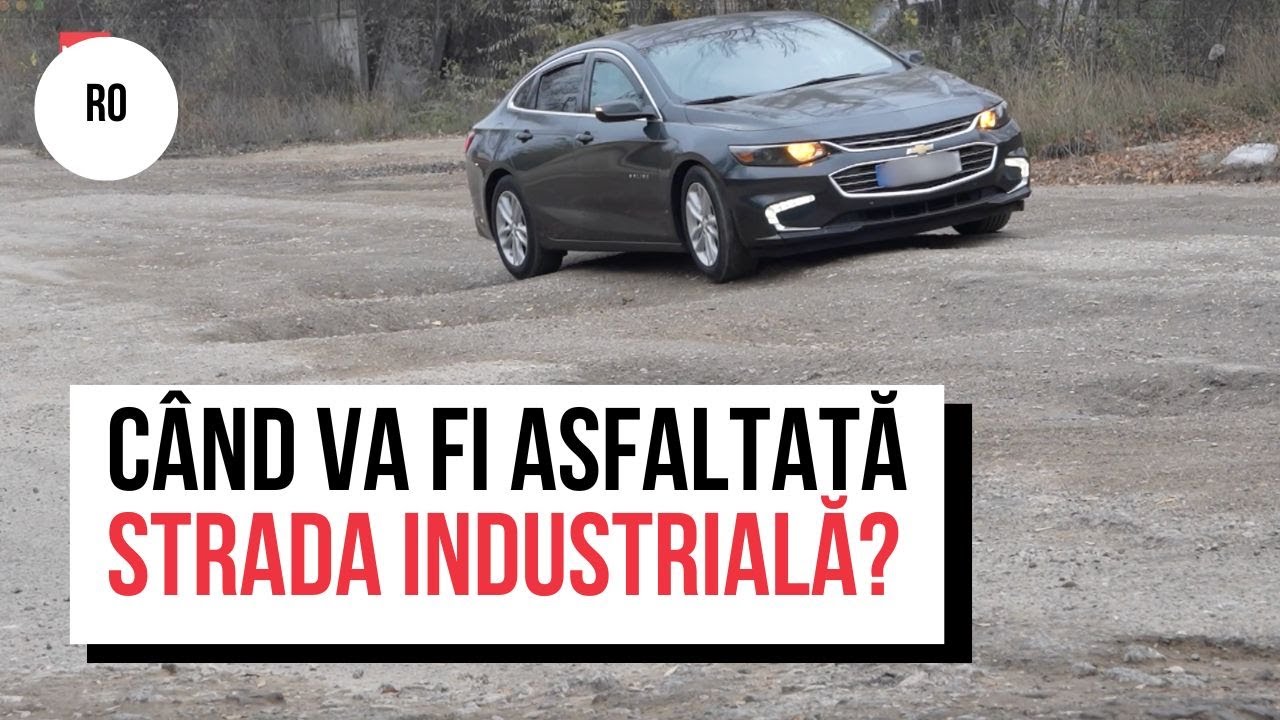 Kilometri de gropi și mașini avariate. C&acirc;nd va fi asfaltată strada Industrială din Chișinău?