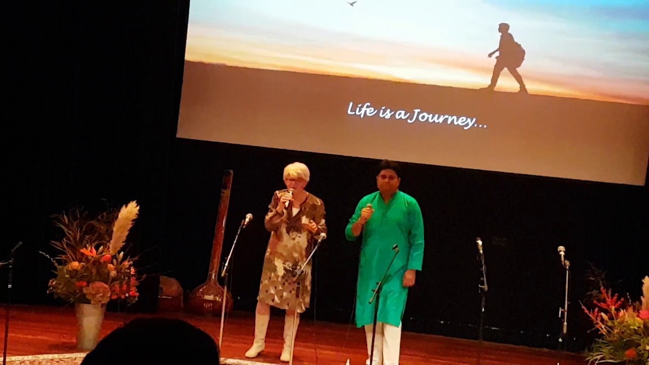Old white women and indian man - Global Ragas 2019