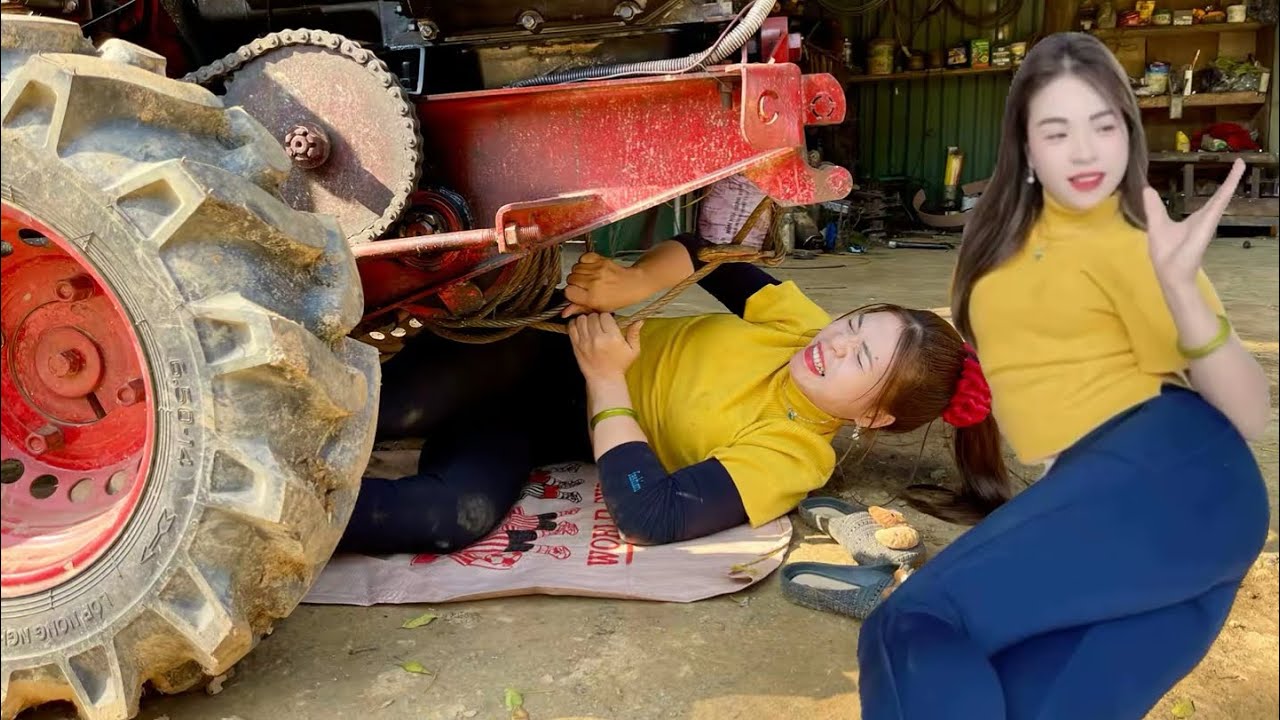 Talented girl repairs and restores tractor for customer