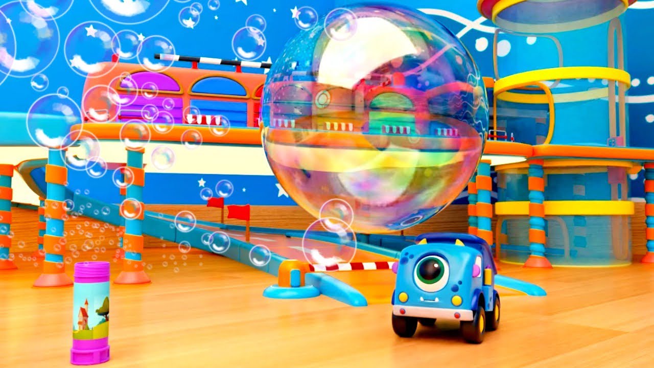The Mocas cars try to blow bubbles, and one car flies away inside a bubble.