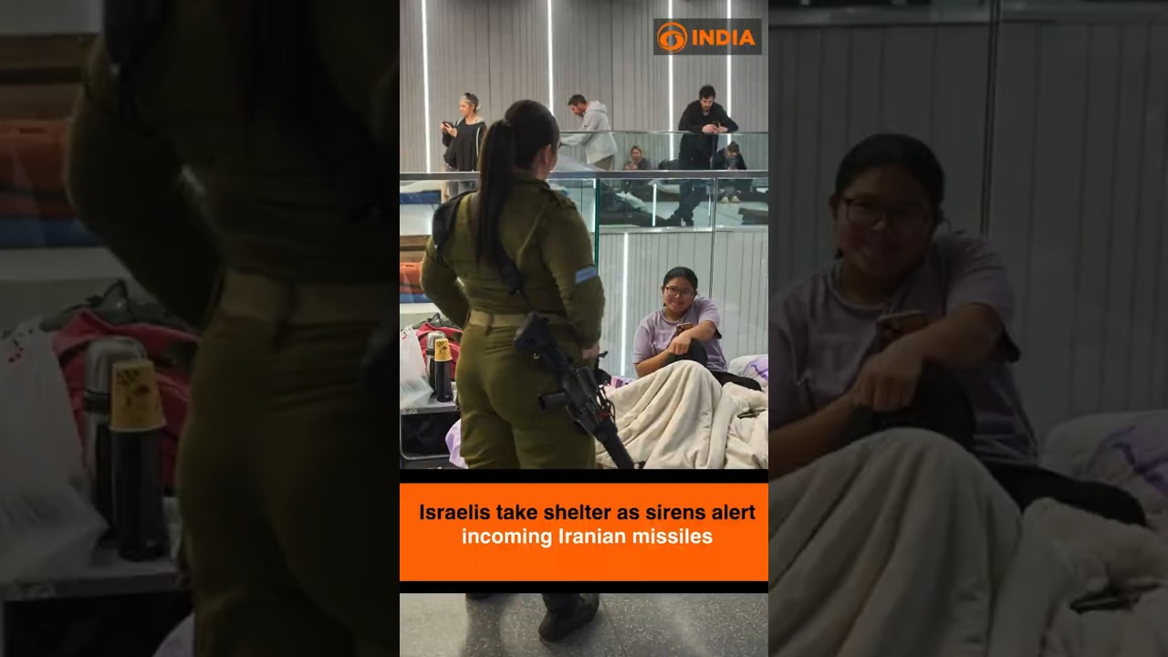 Israelis take shelter as sirens alert incoming Iranian missiles