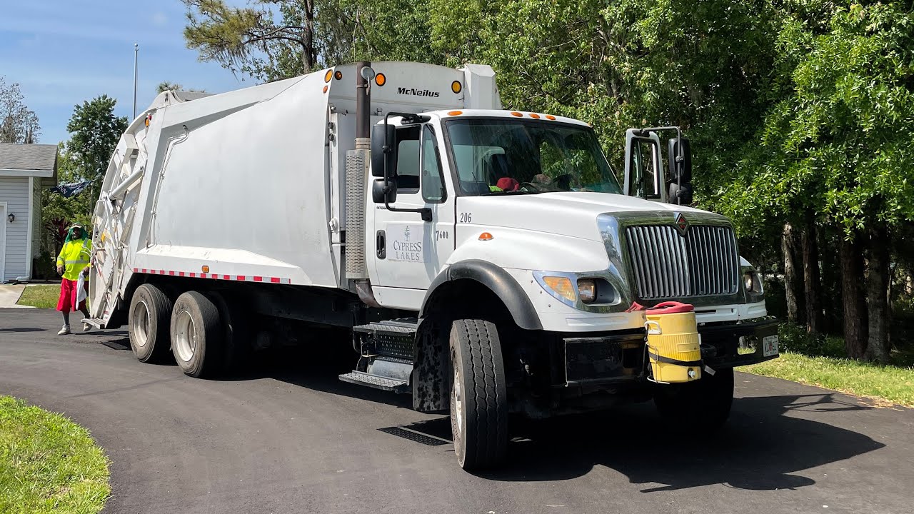 International 7600 McNeilus Rear Loader Flying Through a Florida Trailer Park