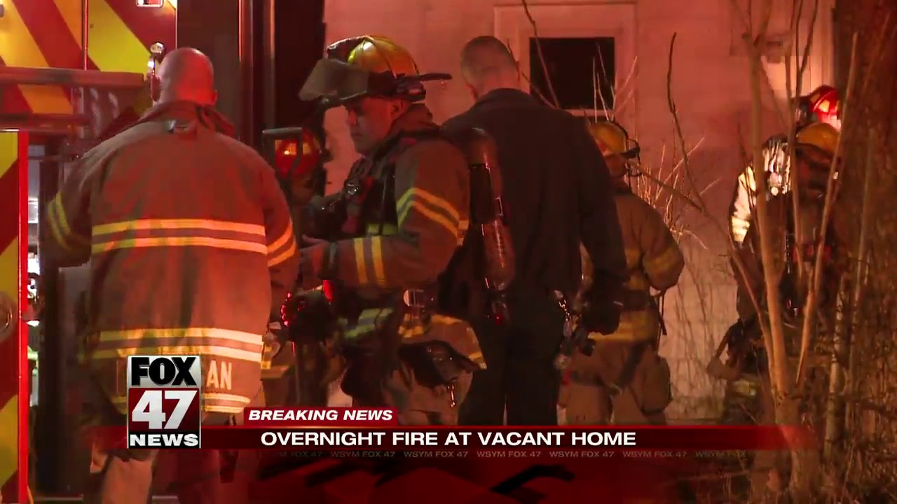 Lansing firefighters battle house fire on south side