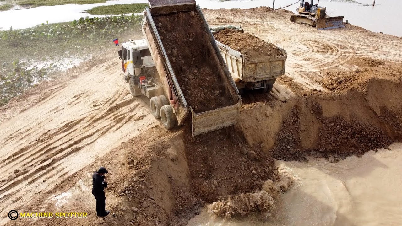 Incrediblel Work By Skills Operator 10Wheel Dump Truck Unloading Dirt Into Water & Bulldozer Pushing