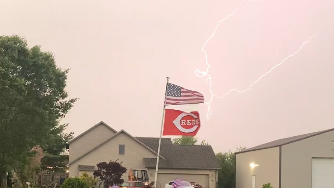 Severe thunderstorms produce 60-70 mph wind gusts, lightning, rainbow, and heavy rain