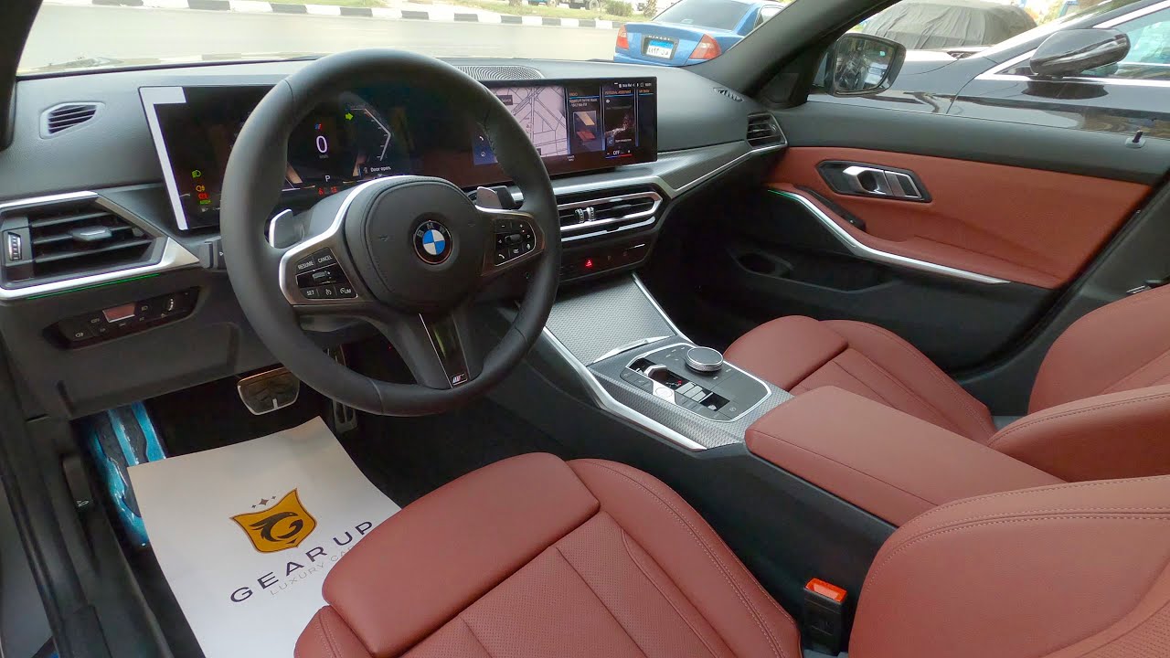Обзор салона BMW 320i M-Sport 2024 Brooklyn Grey, Sensatec Perforated Tacora Red