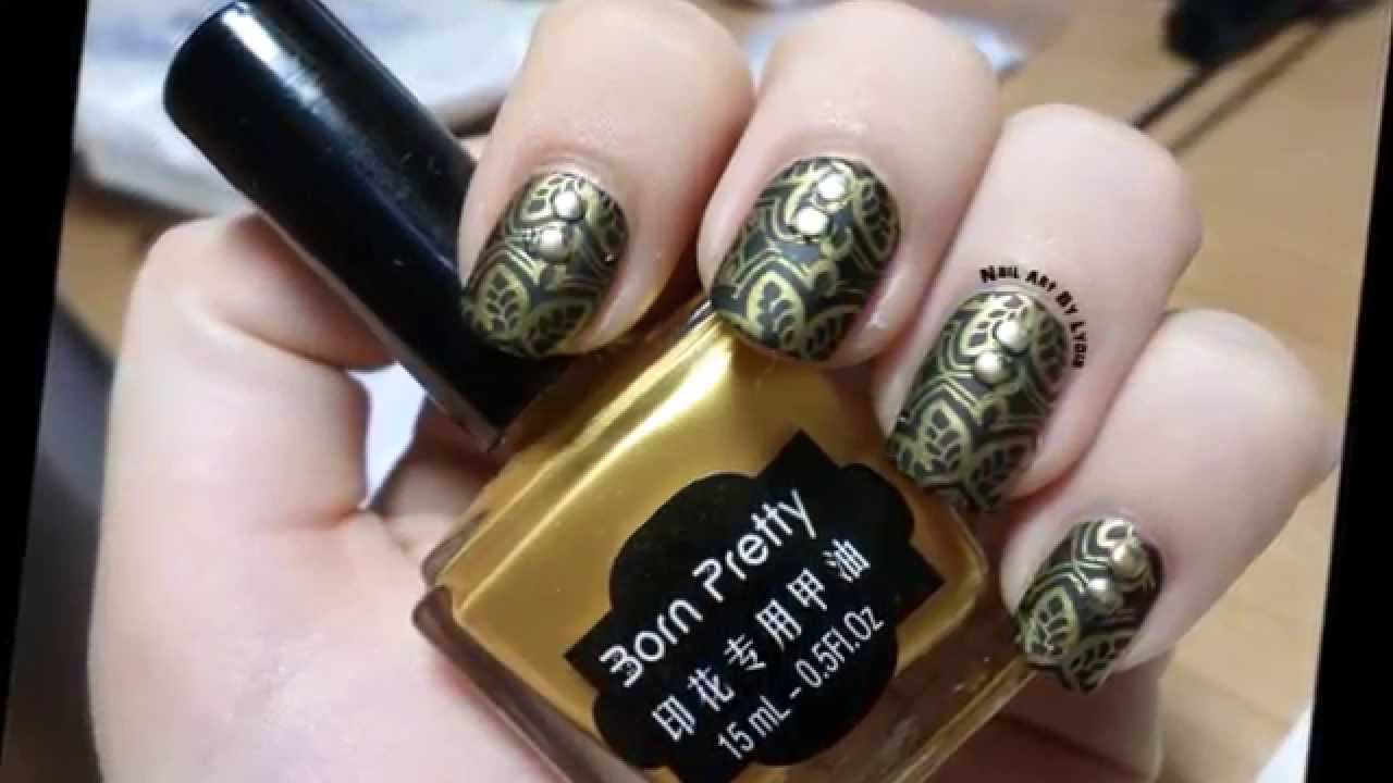 Manicura mate, negra y dorada