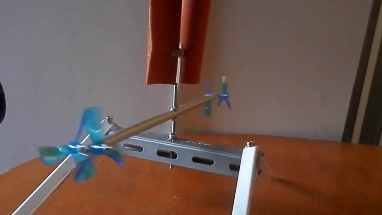 First ever Vertical axis cross low turbine rotates carousel with axial low turbine by George Tonchev