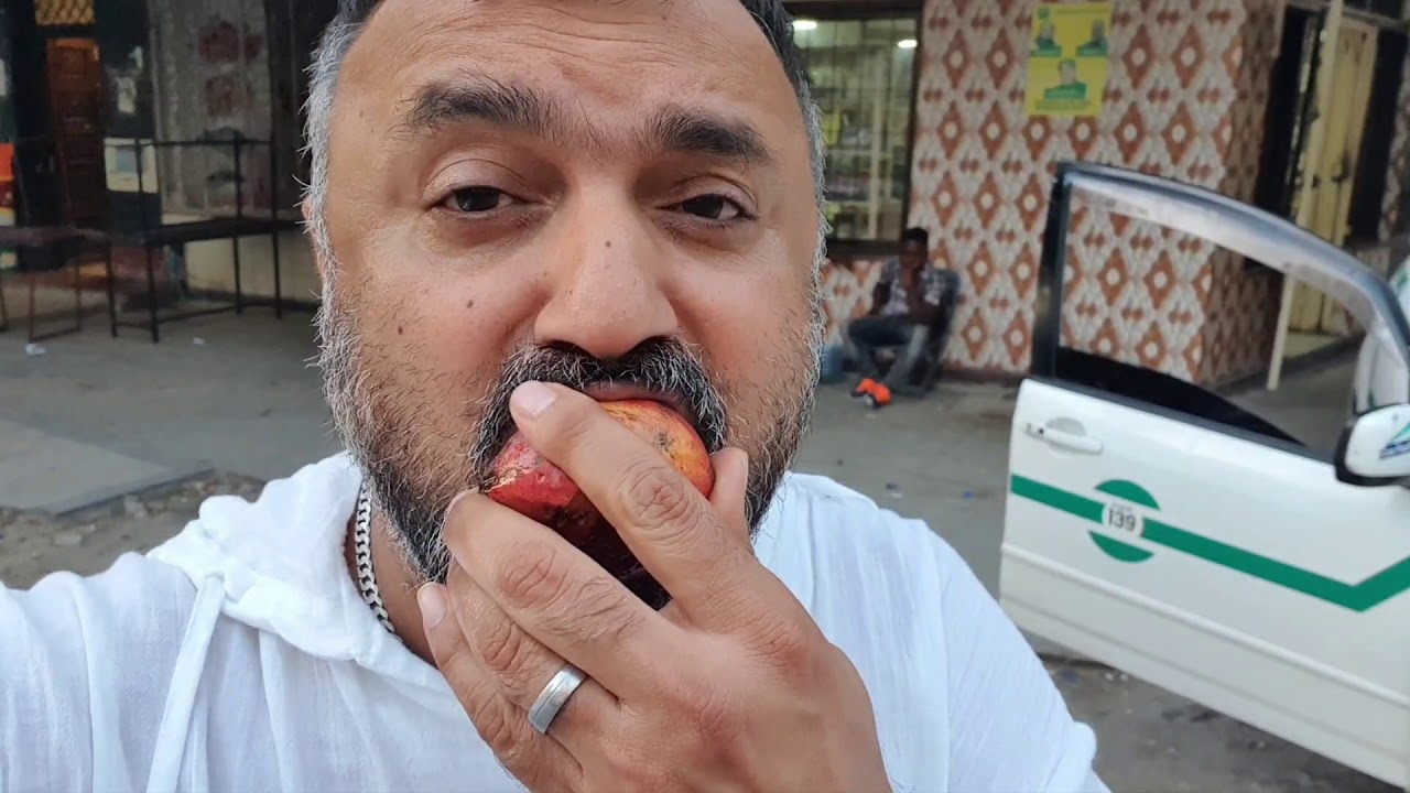 Fruit Sellers on Zanaki, Ali Manga Building and a little bit of Libya Street