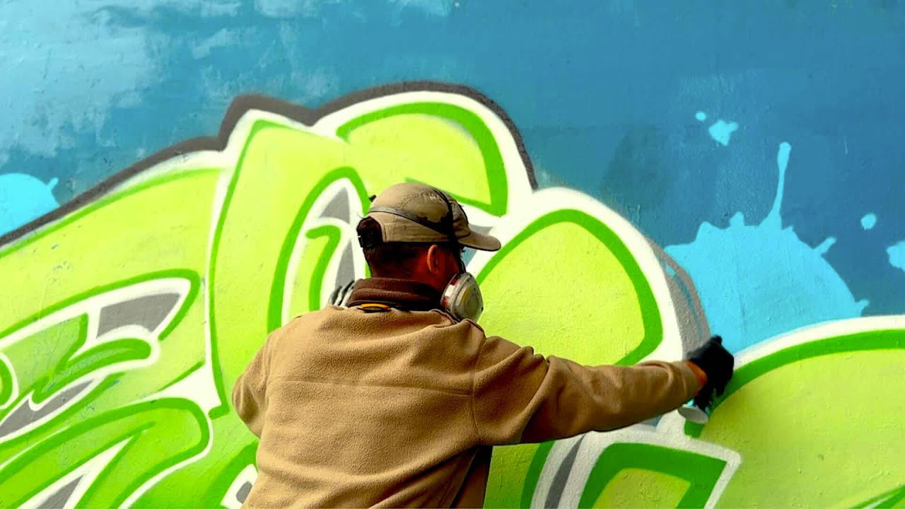ZARK - green fill, white outlines graffiti piece