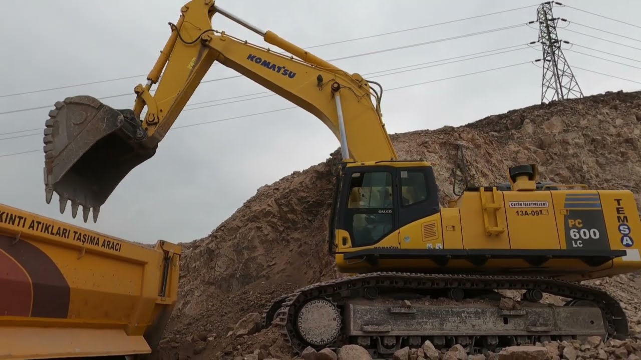 Komatsu Excavator Volvo Trucks Loading
