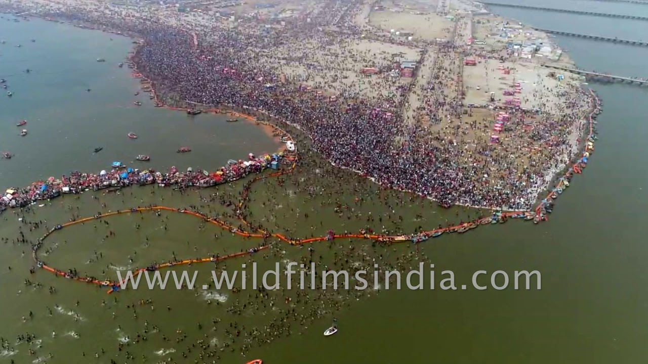 Stunning aerial view of Triveni Sangam : Pilgrims at 'shahi snan' on Mauni Amavasya at Kumbh Mela