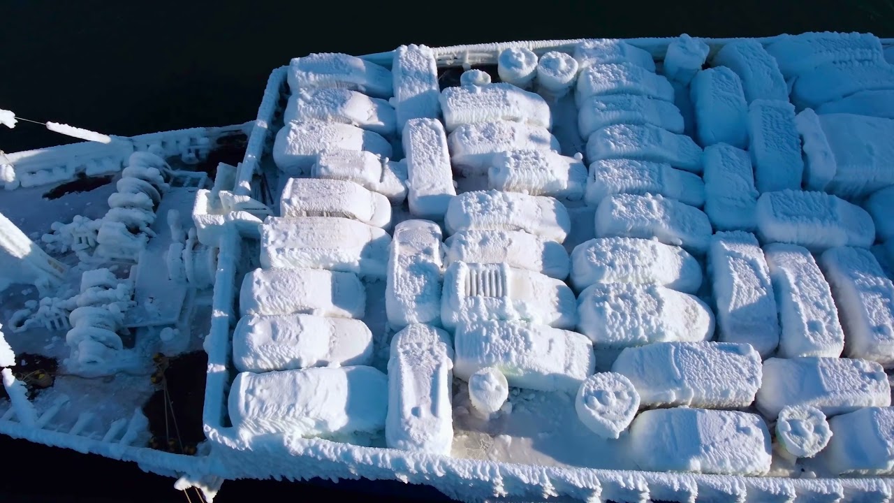 Ice-Caked Ship Carrying Cars Docks in Russia's Far East