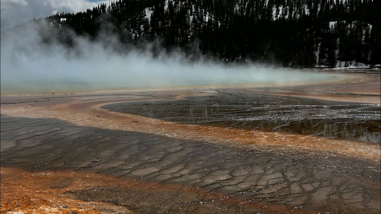 Walking through Yellowstone National Park looking at the geysers. No talking.
