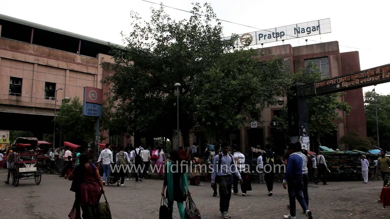 Rickshaws line-up outside Pratap Nagar Metro Station
