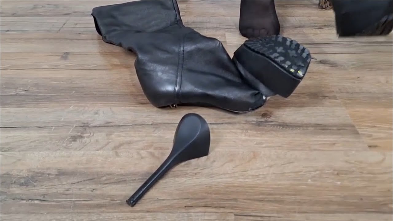 MISTRESS ALENA BROKE HIGH-HEELED BOOTS. TRAMPLING A TOY CAR. TRAILER